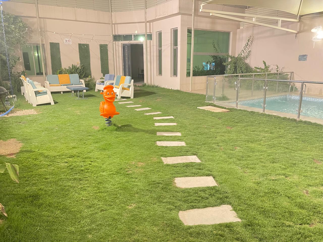 Towlan Chalets garden and pool